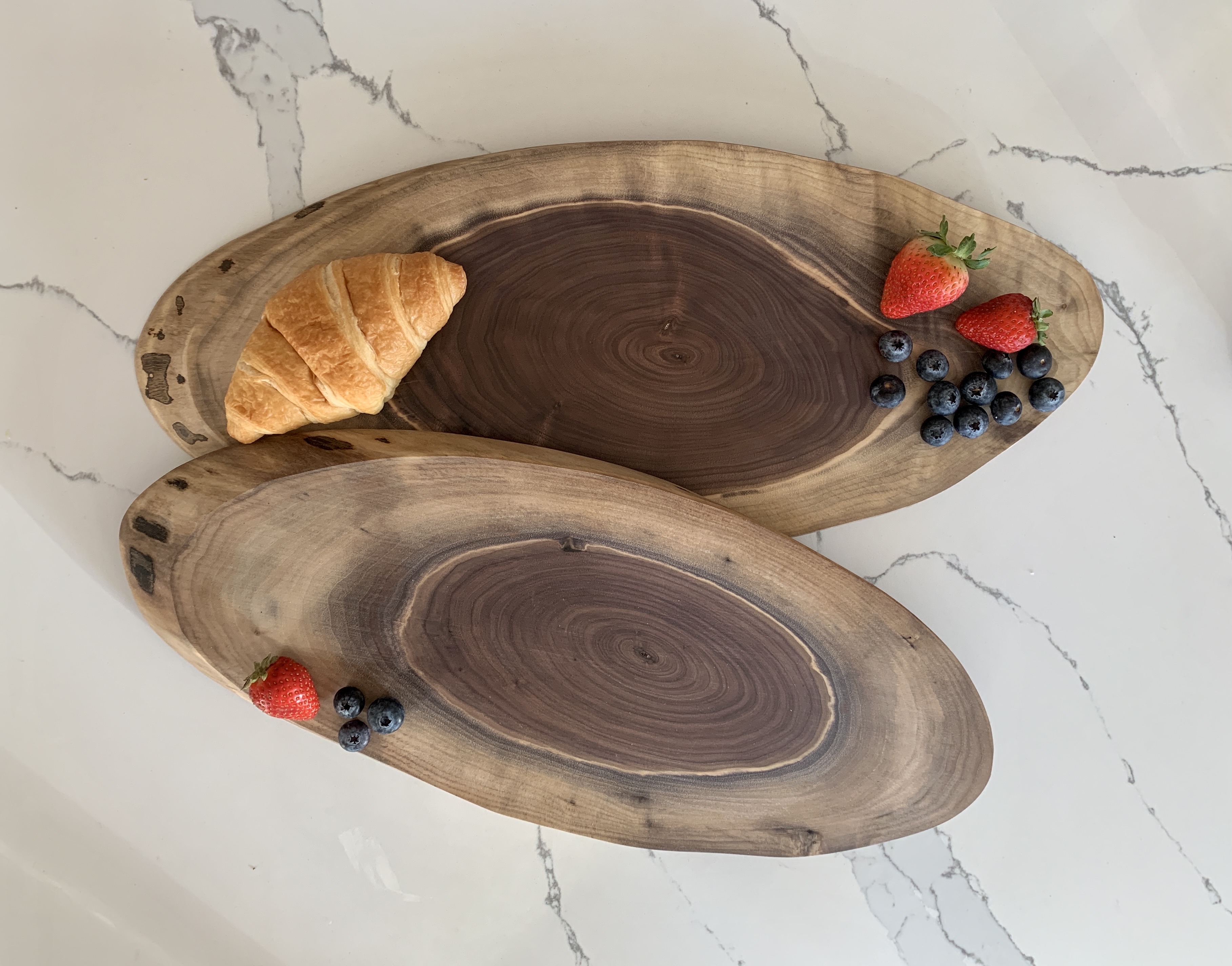 https://serenitycuttingboards.com/ws/media-library/bae81677f78947b1aaabd166188e7b49/2oval-brds.jpg